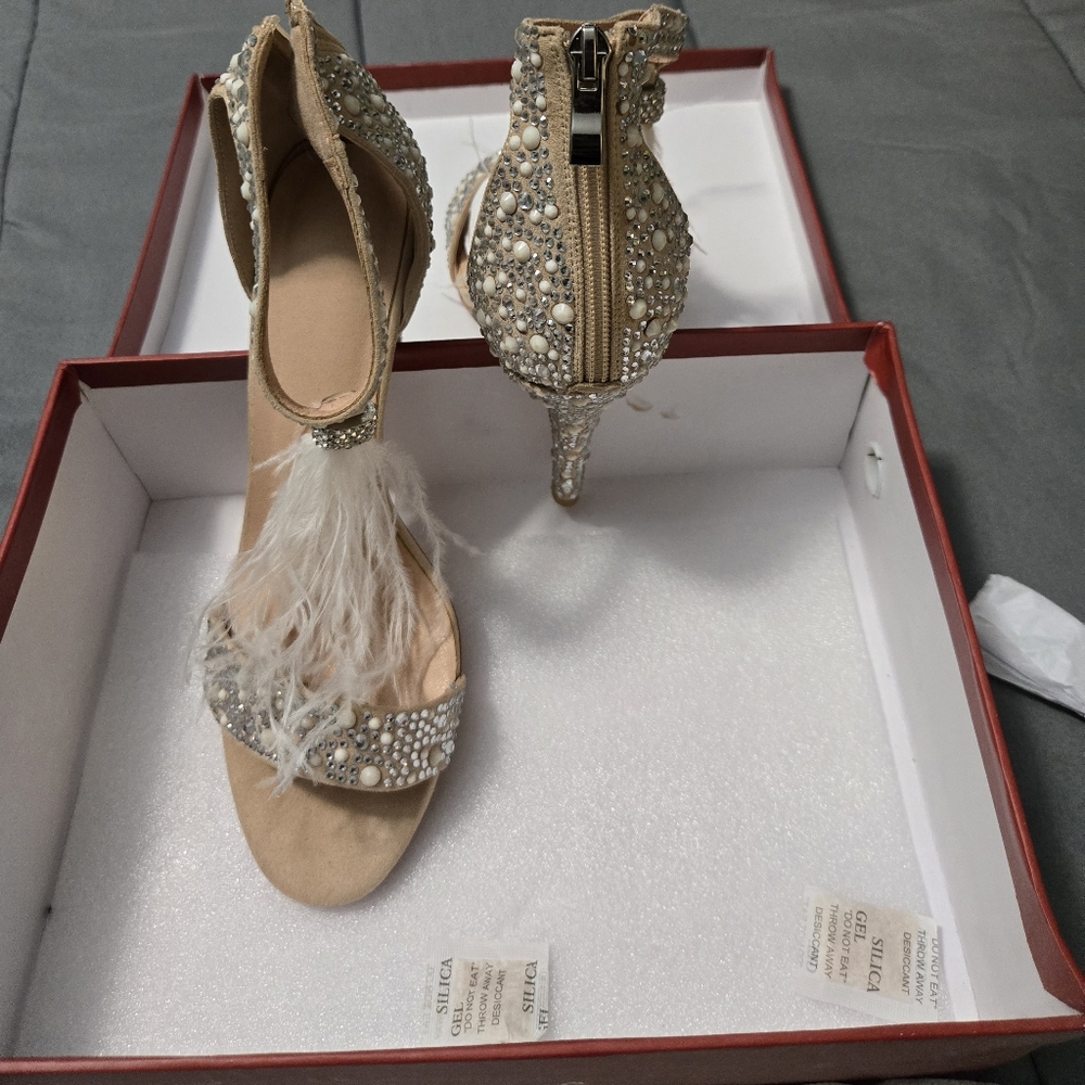 Custome made heels, size 39(US 8.5) with ivory color tassel studded  with bling!